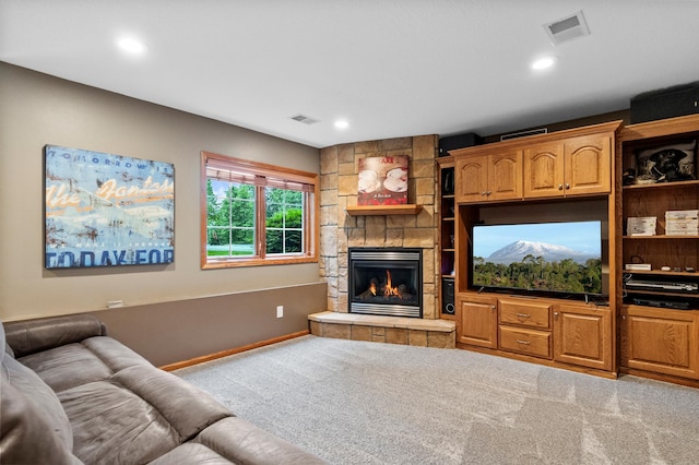 4326 Donway Dr NE, Alexandria, MN 56308 - carpeted living room with a stone fireplace and recessed lighting