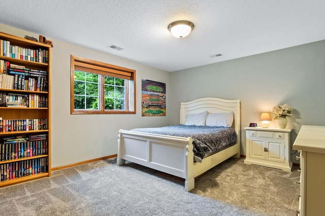 4326 Donway Dr NE, Alexandria, MN 56308 - carpeted bedroom featuring a textured ceiling and baseboards