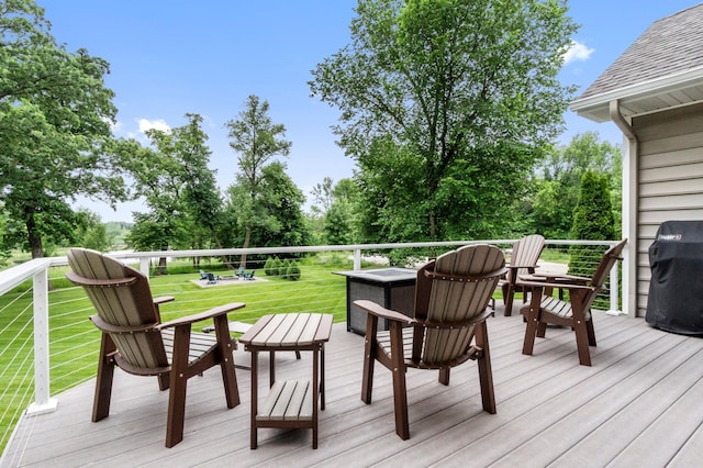 4326 Donway Dr NE, Alexandria, MN 56308 - wooden terrace with a lawn and a grill