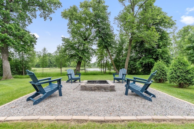 4326 Donway Dr NE, Alexandria, MN 56308 - view of property's community featuring a fire pit, a lawn, and view of scattered trees