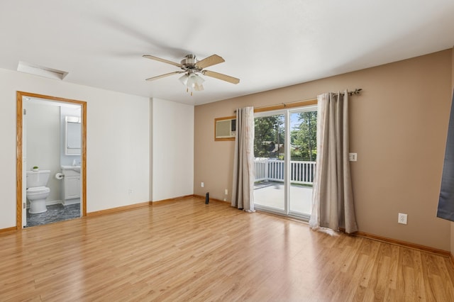 22658 Martin Lake Dr NE, Stacy, MN 55079 - spare room with light wood-style floors, attic access, and ceiling fan