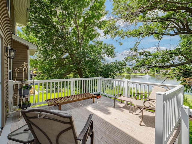 18232 Roosevelt St NW, Elk River, MN 55330 - wooden deck featuring a water view