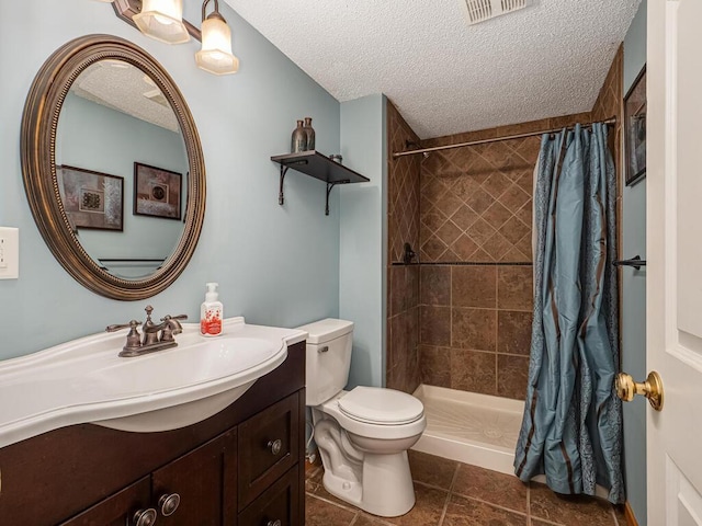 18232 Roosevelt St NW, Elk River, MN 55330 - full bathroom with vanity, a textured ceiling, and a tile shower