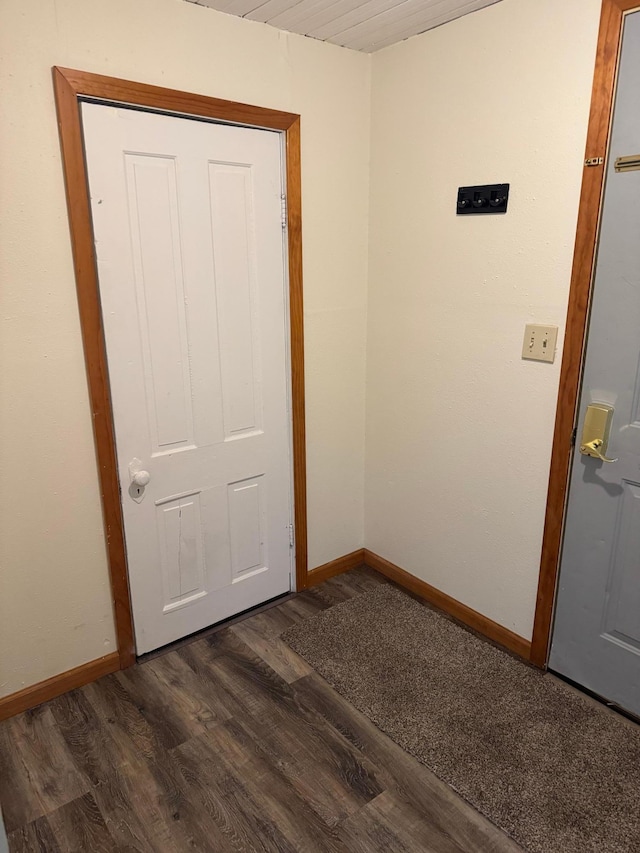 608 Duluth Ave N, Thief River Falls, MN 56701 - empty room with dark wood finished floors and baseboards