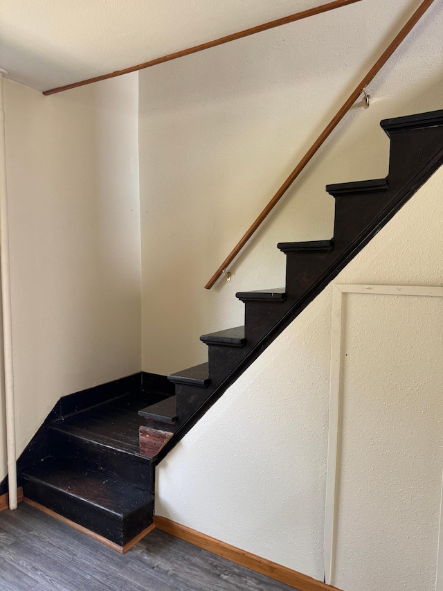 608 Duluth Ave N, Thief River Falls, MN 56701 - stairway with wood finished floors and baseboards