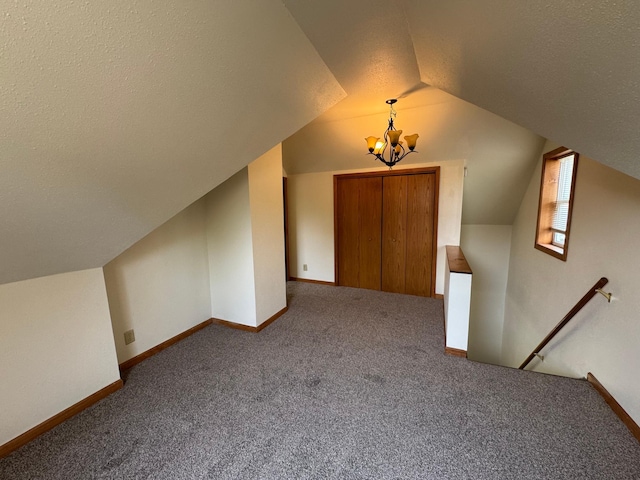 608 Duluth Ave N, Thief River Falls, MN 56701 - bonus room with carpet floors, a chandelier, and lofted ceiling