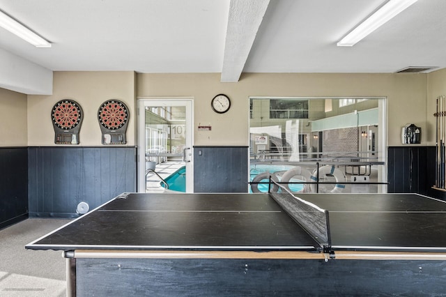 4385 Trenton Ln N Unit 309, Plymouth, MN 55442 - recreation room featuring wainscoting and beamed ceiling