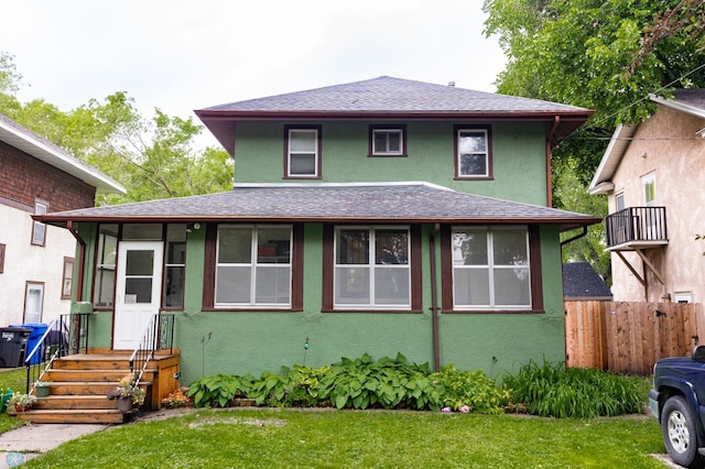 1205 11th St S, Fargo, ND 58103 - american foursquare style home featuring stucco siding and roof with shingles