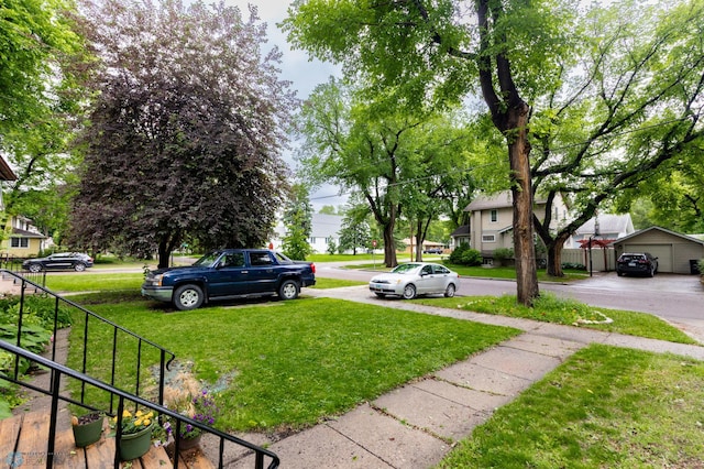 1205 11th St S, Fargo, ND 58103 - view of green lawn featuring an outdoor structure