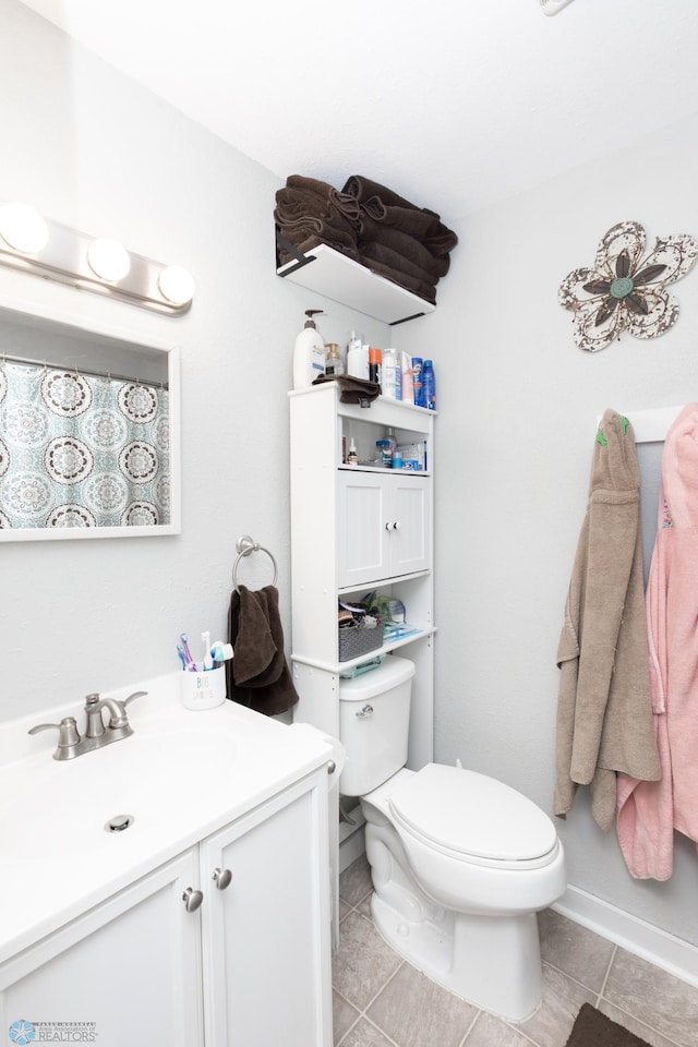 1205 11th St S, Fargo, ND 58103 - full bath featuring vanity and tile patterned flooring