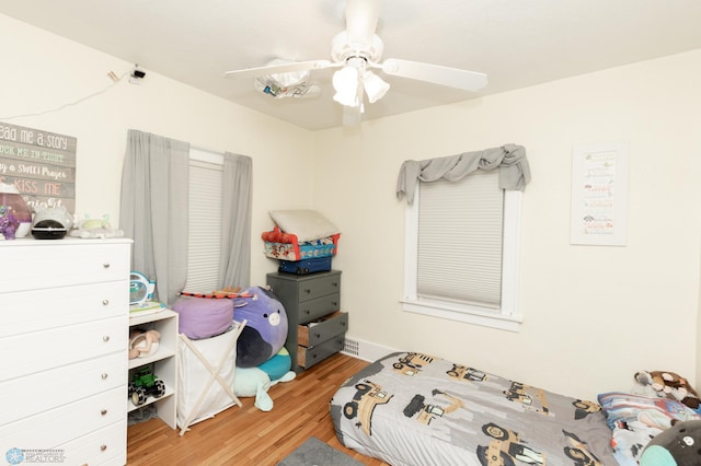 1205 11th St S, Fargo, ND 58103 - bedroom with wood finished floors and a ceiling fan