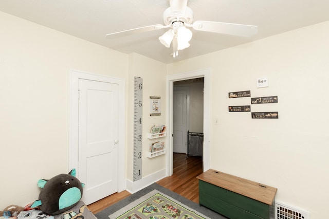 1205 11th St S, Fargo, ND 58103 - workout room with wood finished floors and a ceiling fan