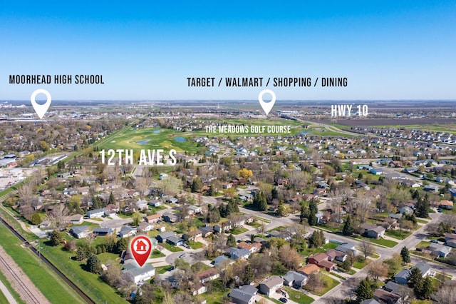 2900 16th Ave S, Moorhead, MN 56560 - aerial view of property's location featuring nearby suburban area and a nearby body of water