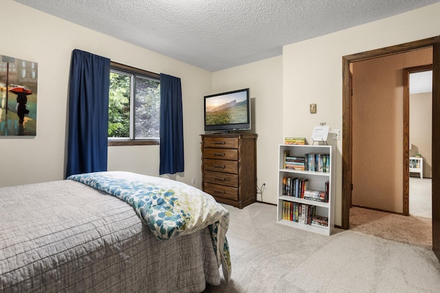 2900 16th Ave S, Moorhead, MN 56560 - carpeted bedroom featuring a textured ceiling