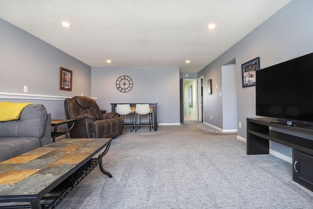 2900 16th Ave S, Moorhead, MN 56560 - living area with carpet flooring, a textured ceiling, and recessed lighting