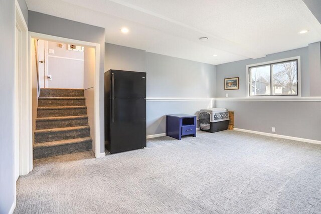 2900 16th Ave S, Moorhead, MN 56560 - basement featuring freestanding refrigerator, carpet flooring, stairway, and recessed lighting