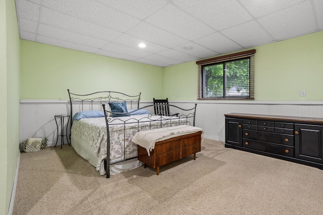 2900 16th Ave S, Moorhead, MN 56560 - bedroom featuring carpet floors, a paneled ceiling, and a wainscoted wall