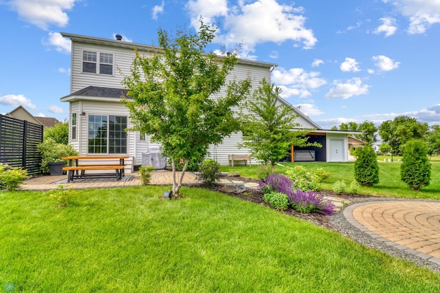6728 Ashwood Loop, Fargo, ND 58104 - rear view of house featuring a patio