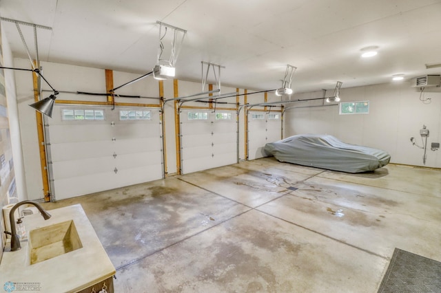 6728 Ashwood Loop, Fargo, ND 58104 - garage with a garage door opener