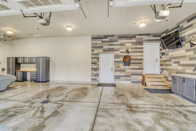 6728 Ashwood Loop, Fargo, ND 58104 - garage with a garage door opener