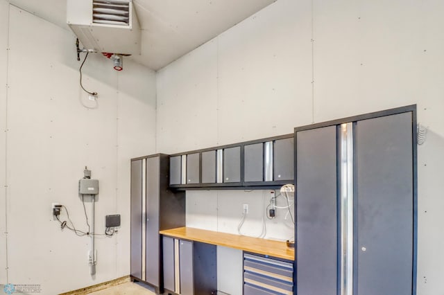 6728 Ashwood Loop, Fargo, ND 58104 - garage with a heating unit