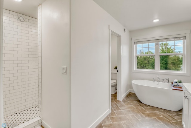 6728 Ashwood Loop, Fargo, ND 58104 - full bathroom with tiled shower, recessed lighting, and a soaking tub