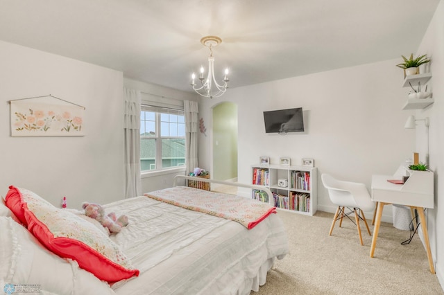 6728 Ashwood Loop, Fargo, ND 58104 - carpeted bedroom featuring a chandelier and arched walkways