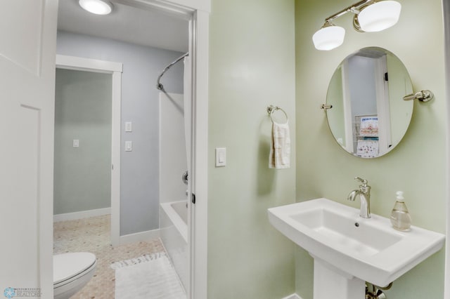 6728 Ashwood Loop, Fargo, ND 58104 - bathroom featuring shower / bath combination and toilet