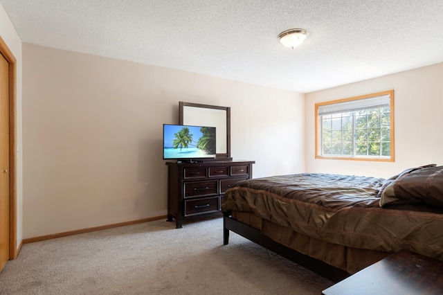 8454 Copperfield Way Unit 75, Inver Grove Heights, MN 55076 - bedroom with light carpet and a textured ceiling
