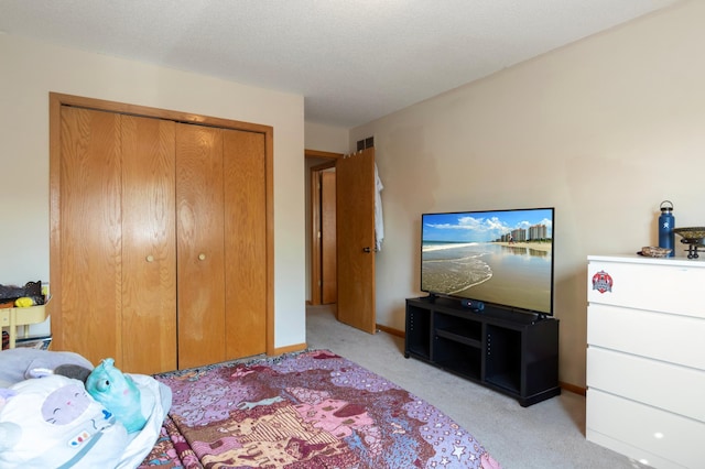 8454 Copperfield Way Unit 75, Inver Grove Heights, MN 55076 - bedroom featuring light colored carpet and a closet