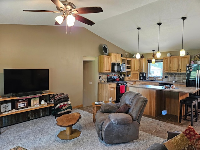 611 3rd St SW, Richville, MN 56576 - living room with a ceiling fan and vaulted ceiling