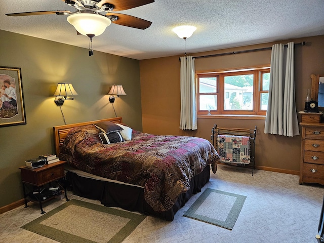 611 3rd St SW, Richville, MN 56576 - carpeted bedroom with a textured ceiling and ceiling fan