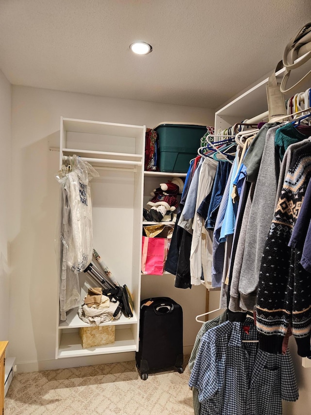 611 3rd St SW, Richville, MN 56576 - spacious closet featuring carpet and a baseboard heating unit