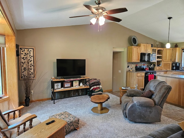 611 3rd St SW, Richville, MN 56576 - living area with ceiling fan, vaulted ceiling, and light colored carpet