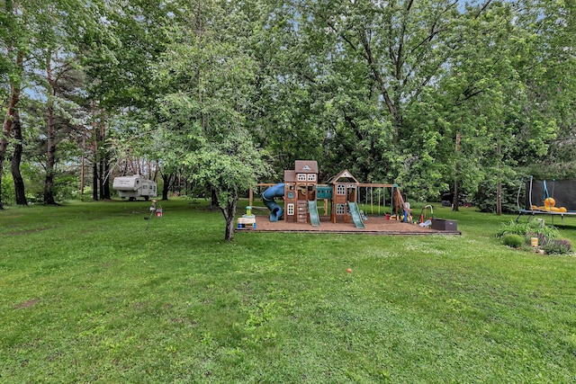 3773 County Road 74, Saint Cloud, MN 56301 - view of green lawn featuring a trampoline and a playground