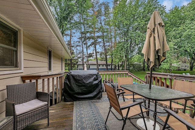 3773 County Road 74, Saint Cloud, MN 56301 - wooden terrace with area for grilling and outdoor dining space