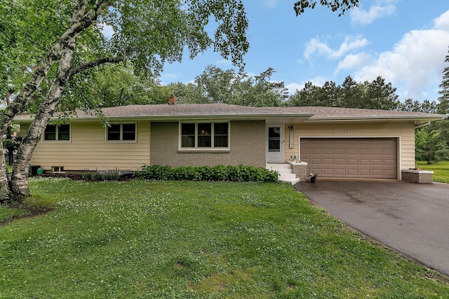 3773 County Road 74, Saint Cloud, MN 56301 - ranch-style house with asphalt driveway, an attached garage, and a front yard