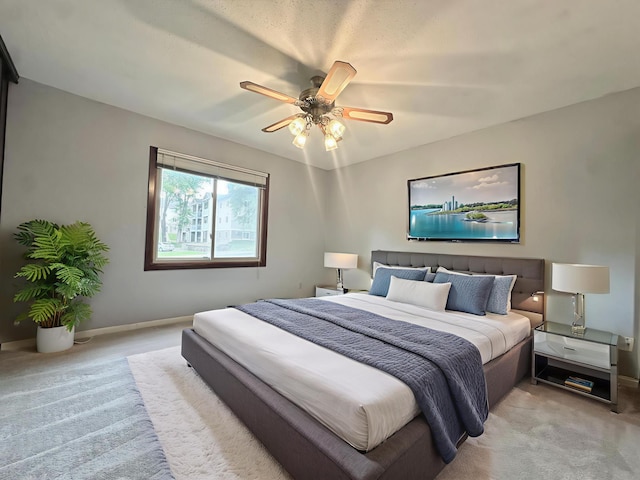 2360 3rd St NW, New Brighton, MN 55112 - bedroom with light carpet and ceiling fan