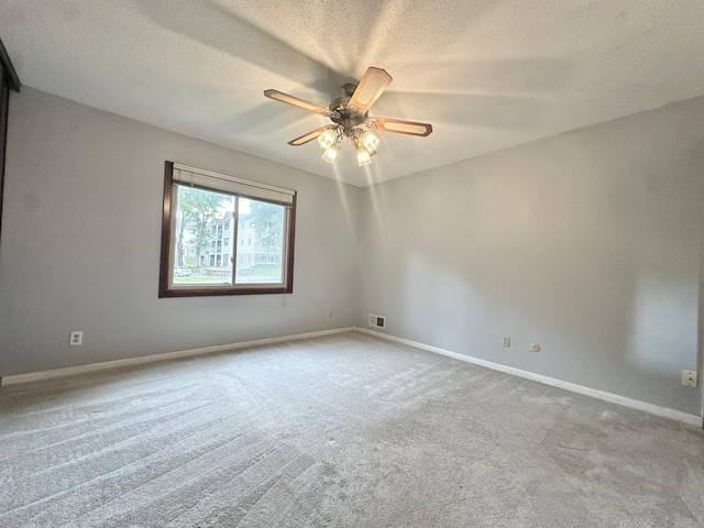 2360 3rd St NW, New Brighton, MN 55112 - carpeted empty room with a ceiling fan and a textured ceiling