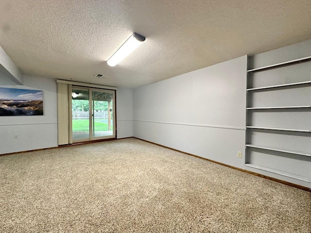 2360 3rd St NW, New Brighton, MN 55112 - spare room featuring carpet flooring, a textured ceiling, and built in shelves