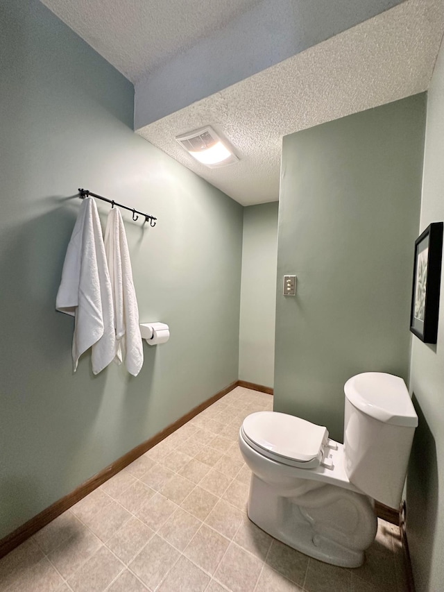 2360 3rd St NW, New Brighton, MN 55112 - half bathroom with toilet and a textured ceiling