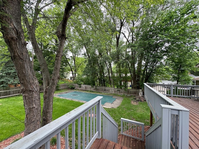 2360 3rd St NW, New Brighton, MN 55112 - wooden deck with a fenced backyard and a covered pool