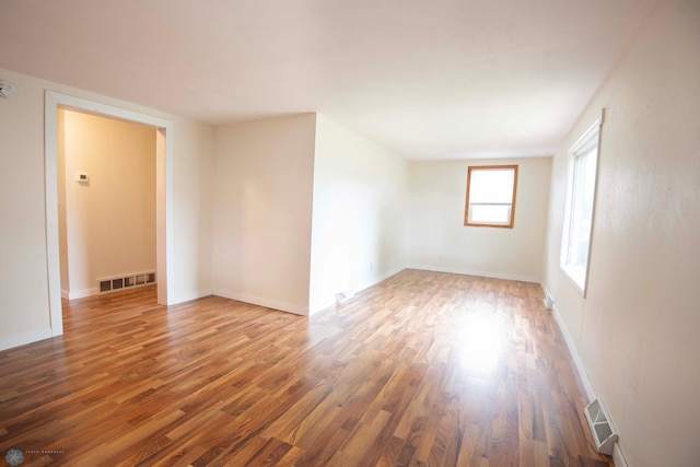 405 18th St N, Moorhead, MN 56560 - unfurnished room with wood finished floors and baseboards