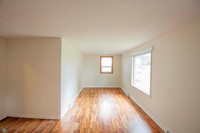 405 18th St N, Moorhead, MN 56560 - unfurnished room featuring light wood-style flooring and baseboards