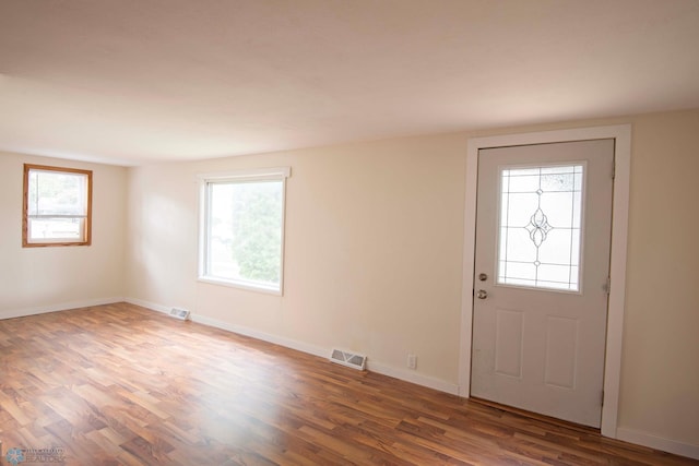405 18th St N, Moorhead, MN 56560 - entryway with healthy amount of natural light and wood finished floors