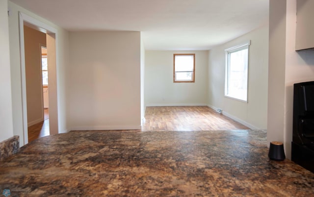405 18th St N, Moorhead, MN 56560 - unfurnished living room featuring wood finished floors