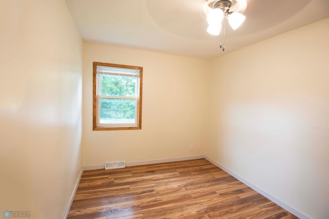 405 18th St N, Moorhead, MN 56560 - spare room with wood finished floors and ceiling fan