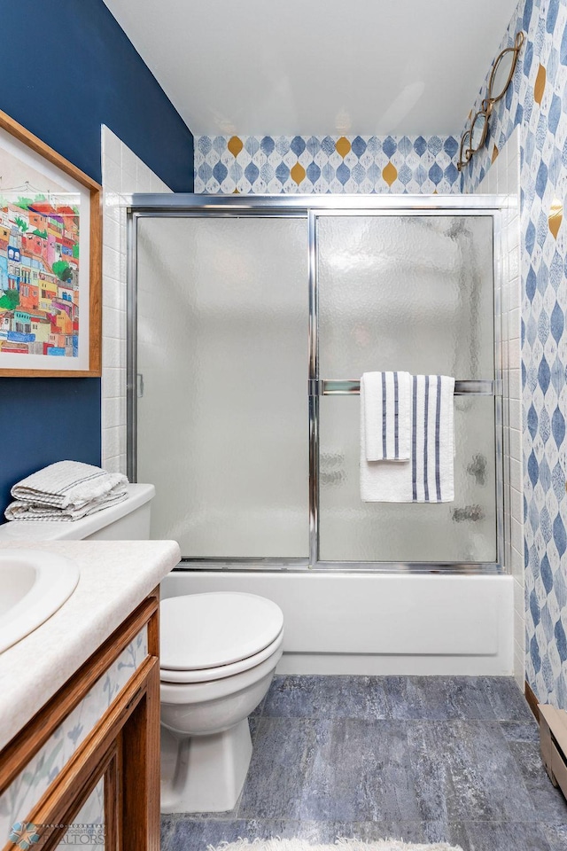 722 Elm St N Unit A8, Fargo, ND 58102 - bathroom featuring vanity, bath / shower combo with glass door, and a baseboard radiator