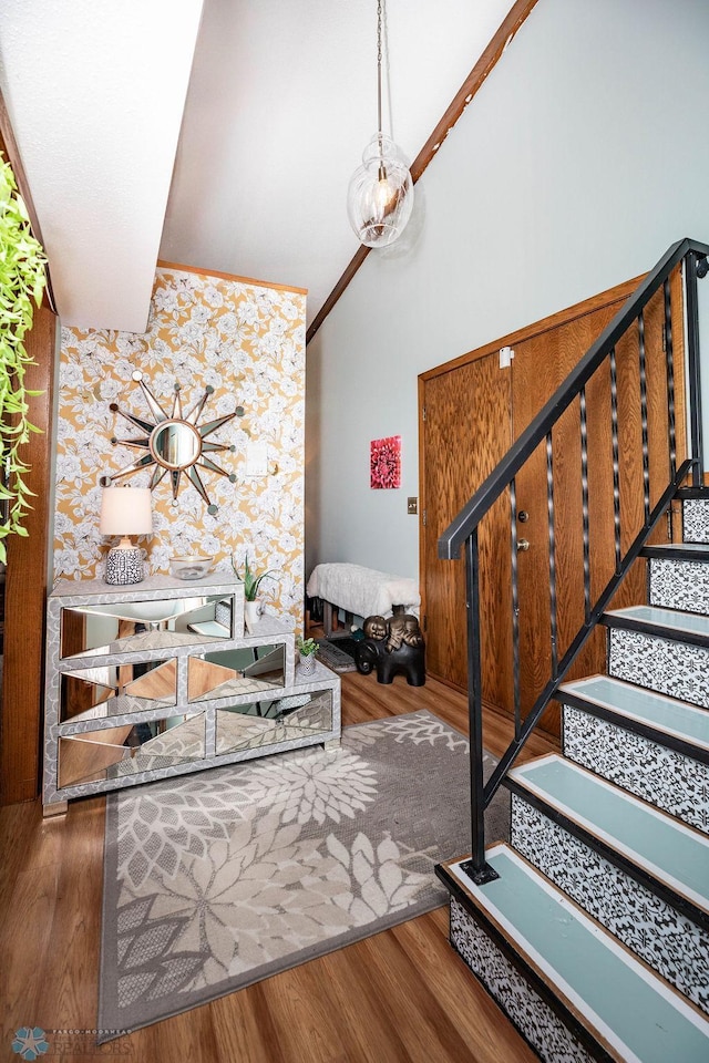 722 Elm St N Unit A8, Fargo, ND 58102 - staircase with wood finished floors and vaulted ceiling