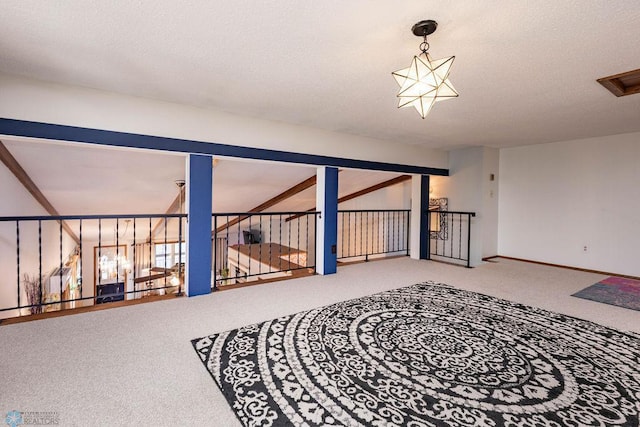 722 Elm St N Unit A8, Fargo, ND 58102 - carpeted empty room with a textured ceiling
